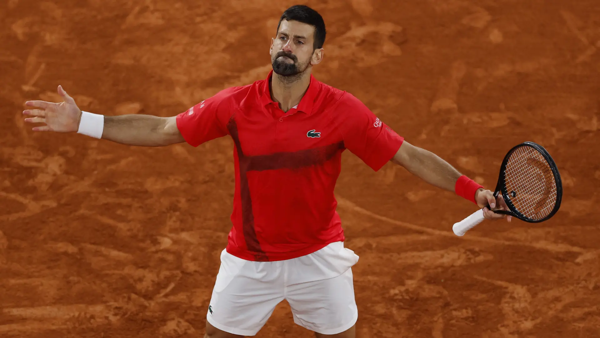 2025-06-06T201159Z_1262218384_UP1EL661K3X1J_RTRMADP_3_TENNIS-FRENCHOPEN novak đoković reuters-68435014be3ff.webp
