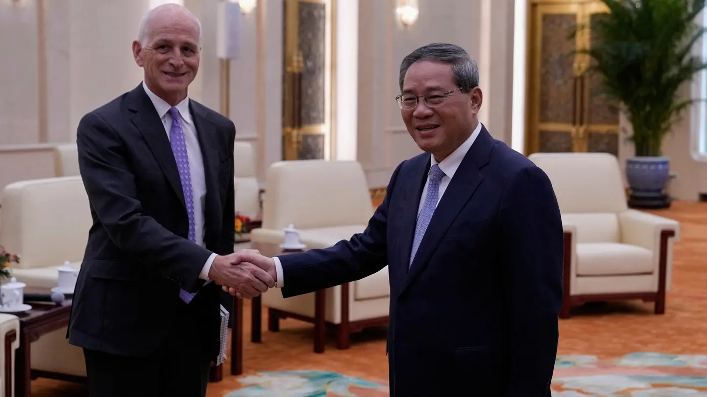 adam smit, li ćijang, 21 sept 2025 - Reuters-68d00ece6a520.webp