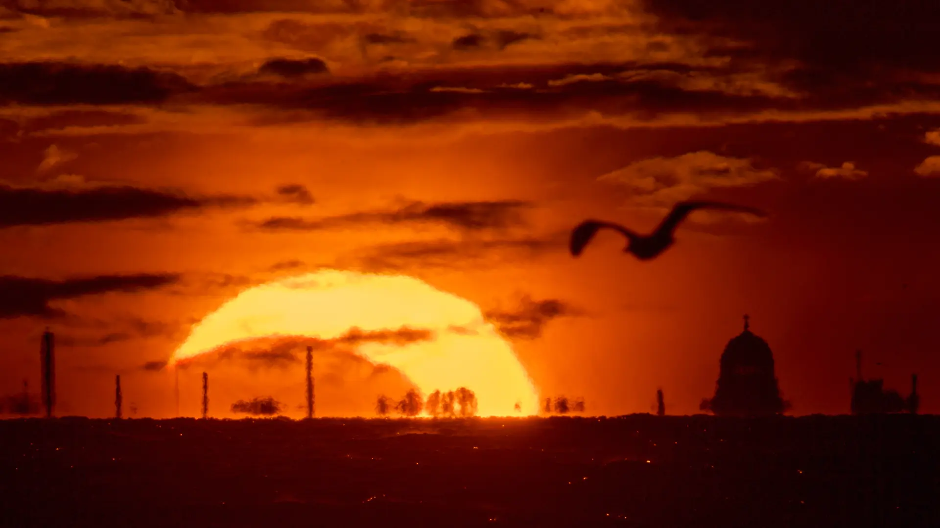 AP PhotoDmitri Lovetsky pomračenje sunca sunce-6a7dce9d7641f.webp